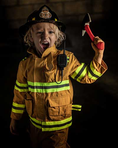 boy in firefighter costume