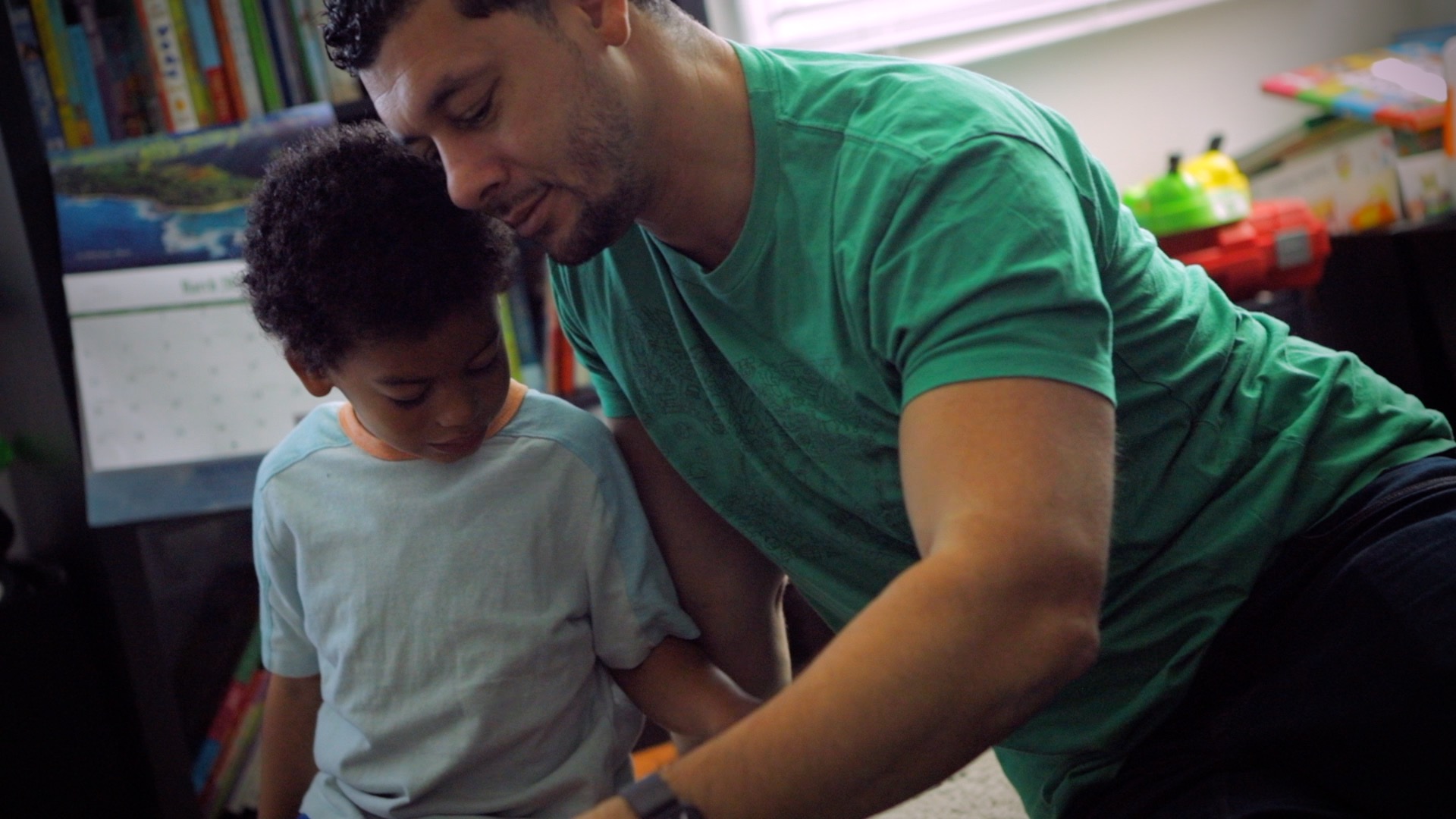 a dad playing with his son